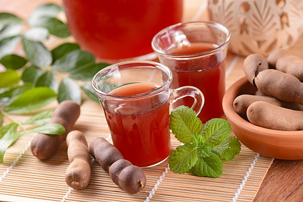 delicious drink tamarind with mint leaves التمر الهندي: